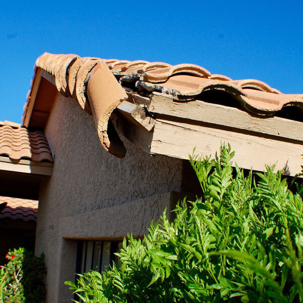 Roof home and property damage Roof damaged by the wind