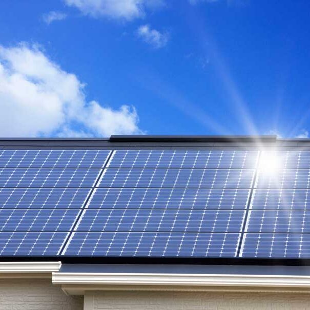 Solar-panel-roof Solar Roof with the sun shining on it