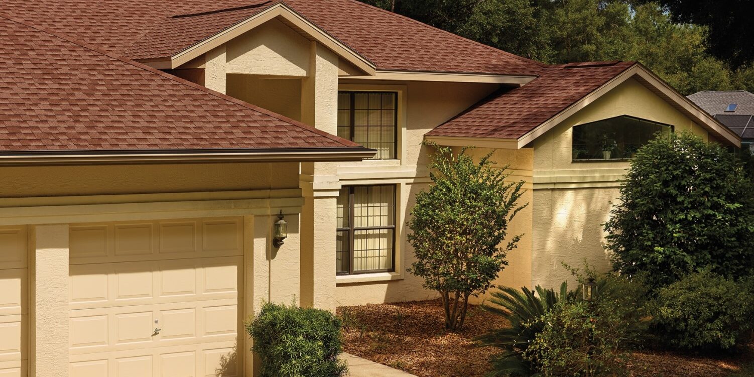 GAF Red Brick Shingles Home with red brick shingles