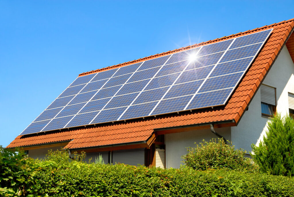 Solar panels on red tile roof