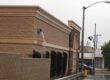 Commercial building with external drain