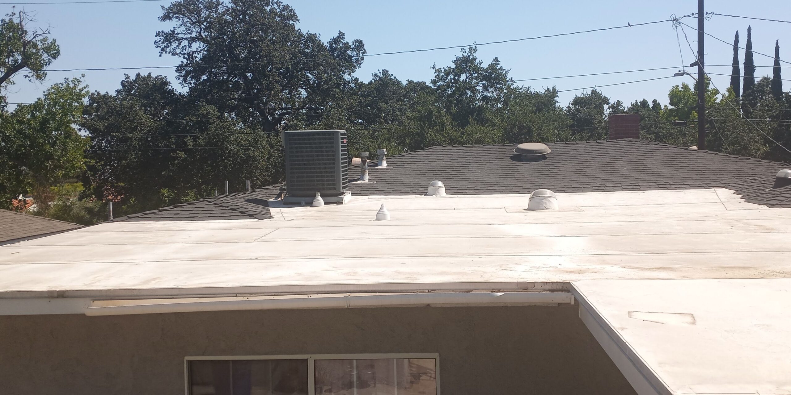 20220815_144923 Home with white flat roof