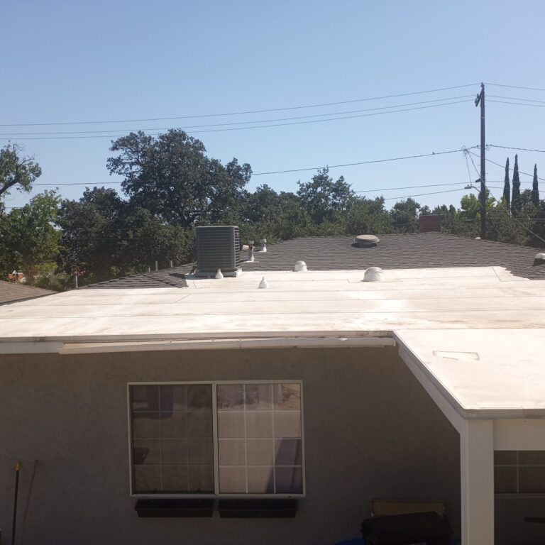 20220815_144923 Home with white flat roof