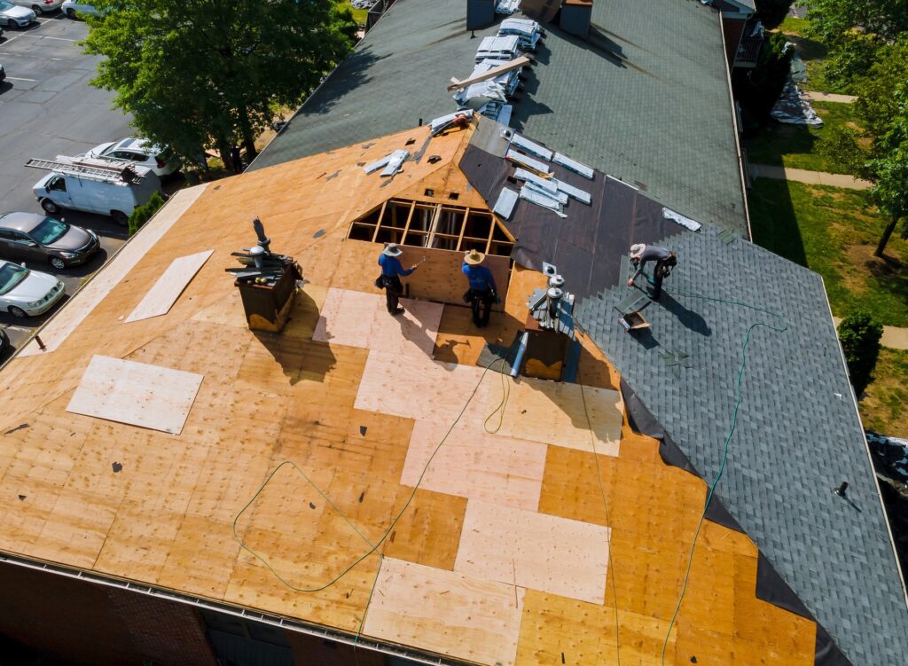 Workers installing a new roof
