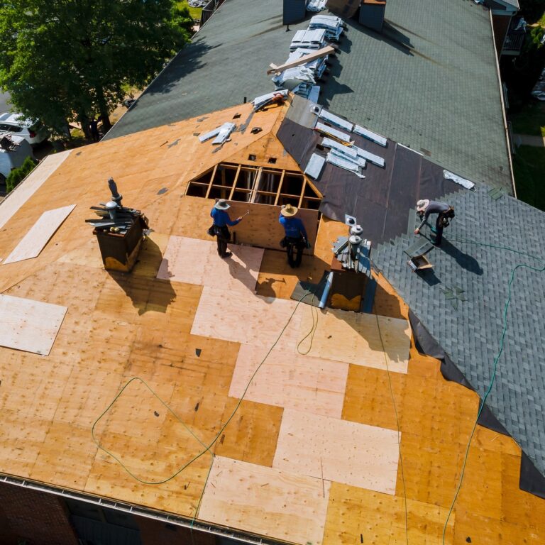 New Roof installation Workers installing a new roof