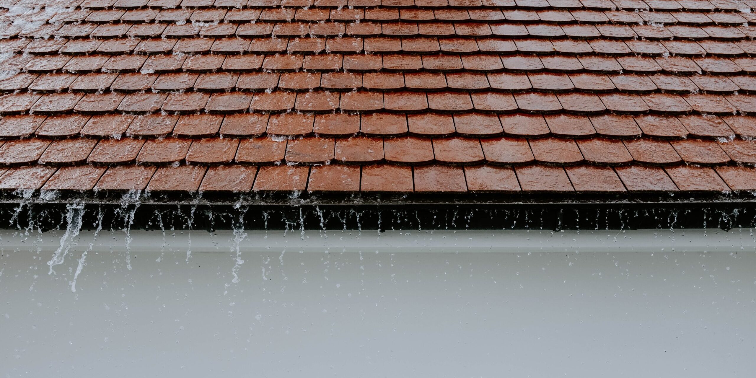 Rain falling on tile roog Rain on tile roof