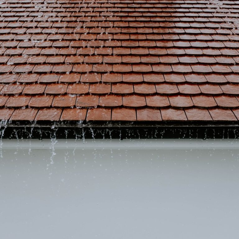 Rain falling on tile roog Rain on tile roof