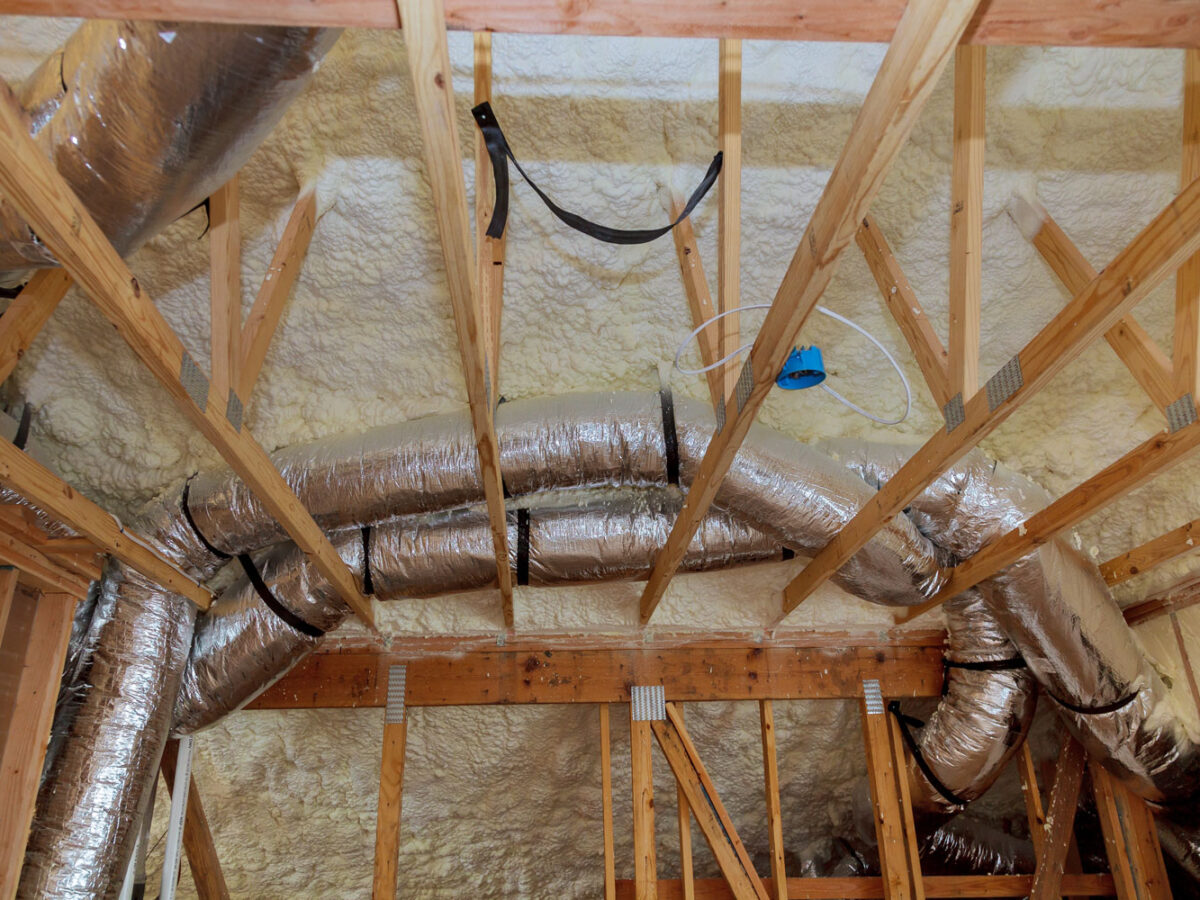 Insulation of attic with fiberglass.
