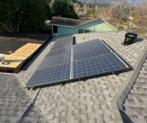 Solar System and panels on a roof.