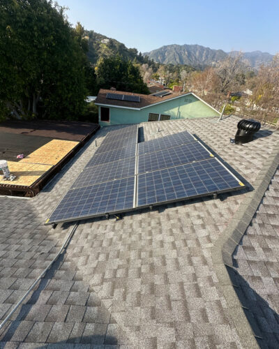 Solar System and panels on a roof.