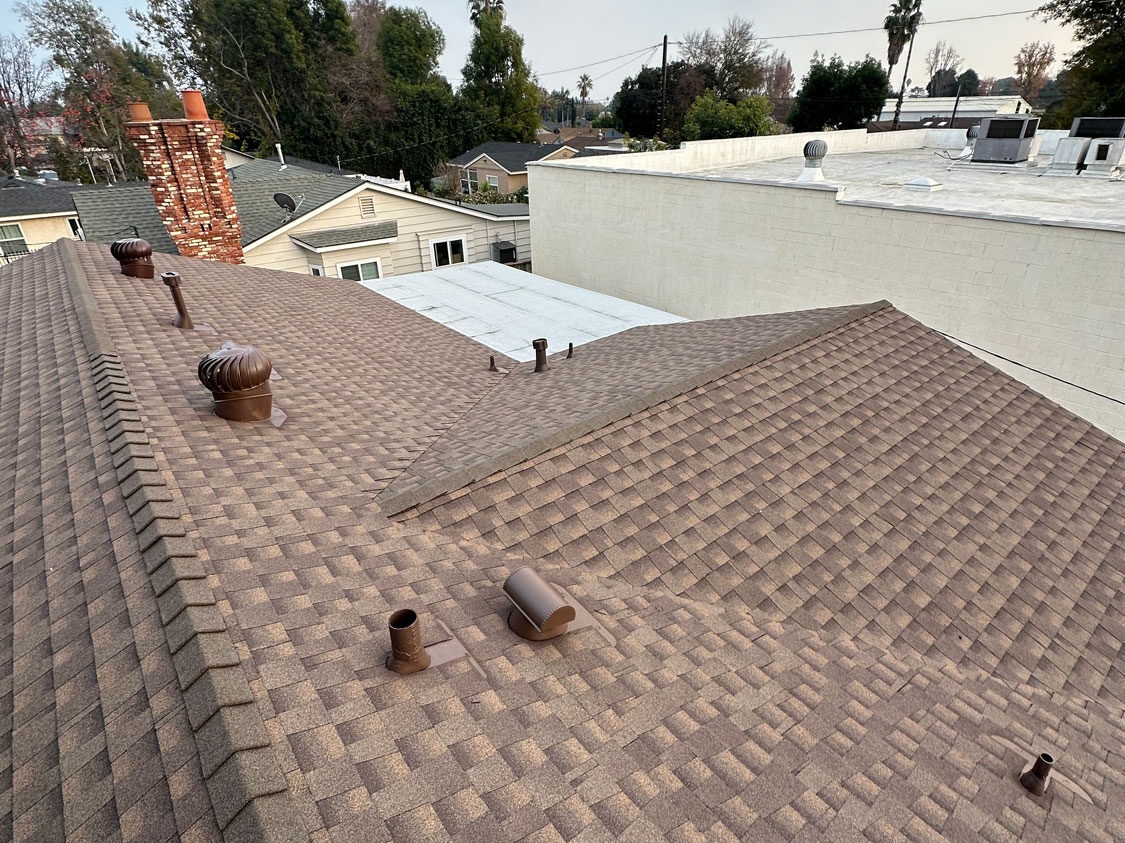 Finished roof with roofing shingles.