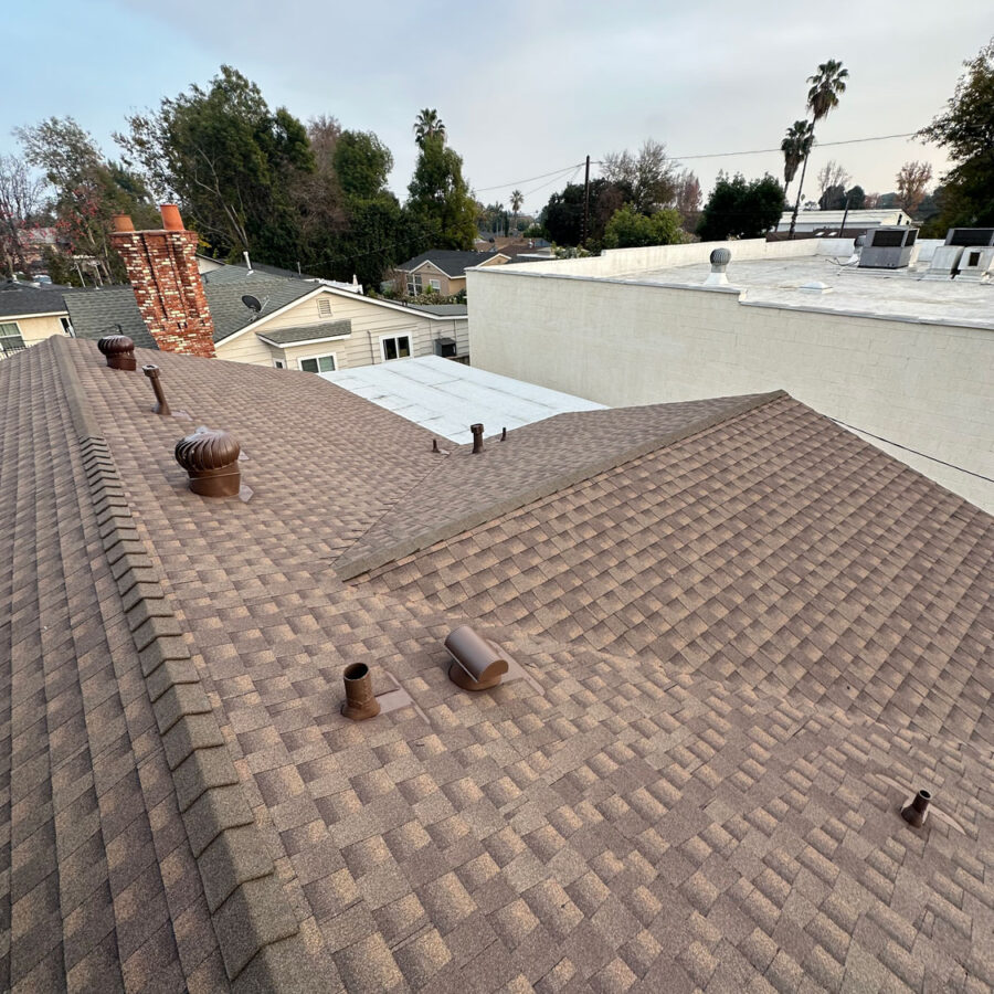 Finished roof with roofing shingles.
