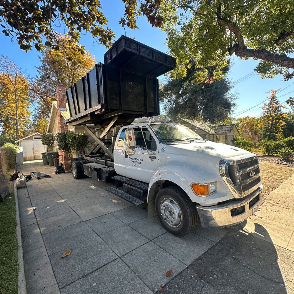 Company truck on customer house property.