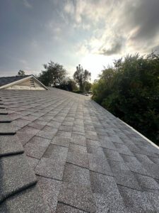 Long side view of a finished roof.