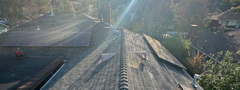 New roof with solar system install by Garvey Roofing.