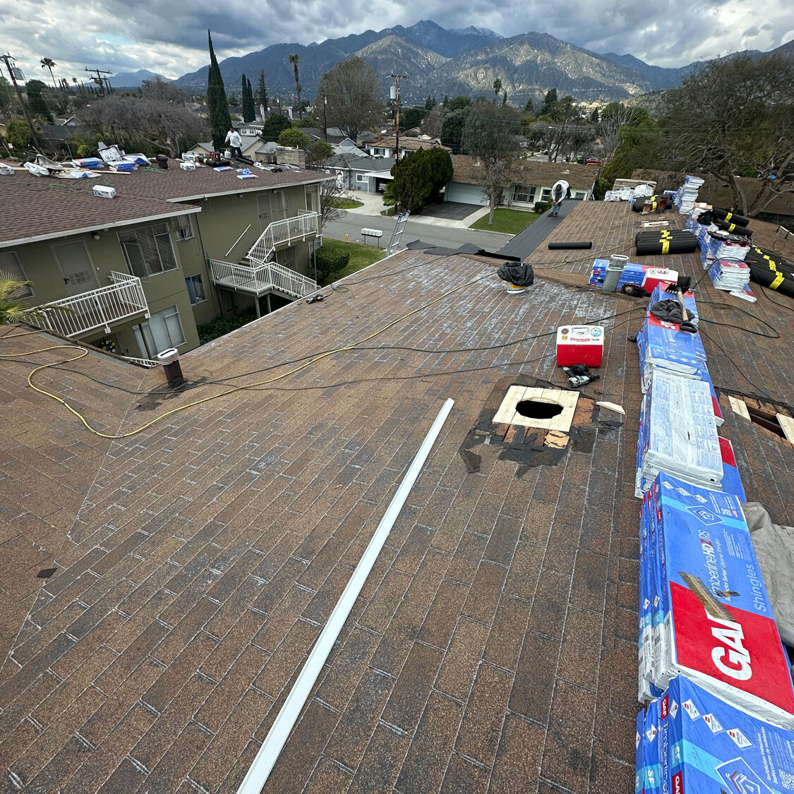 Apartment roof install showing the materials on roof.