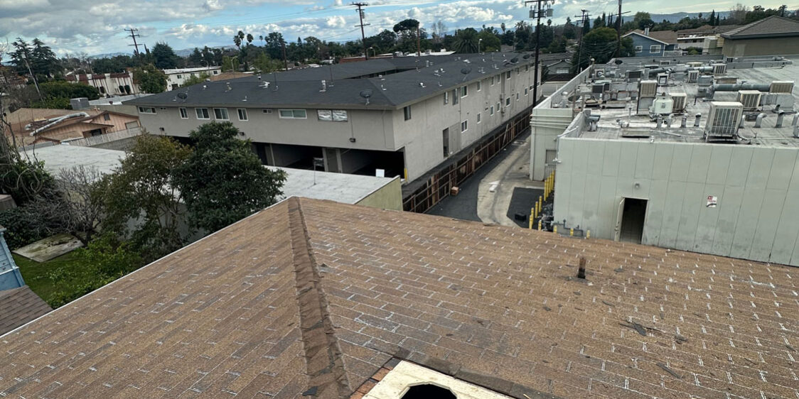 Apartment roof install showing the materials on roof.