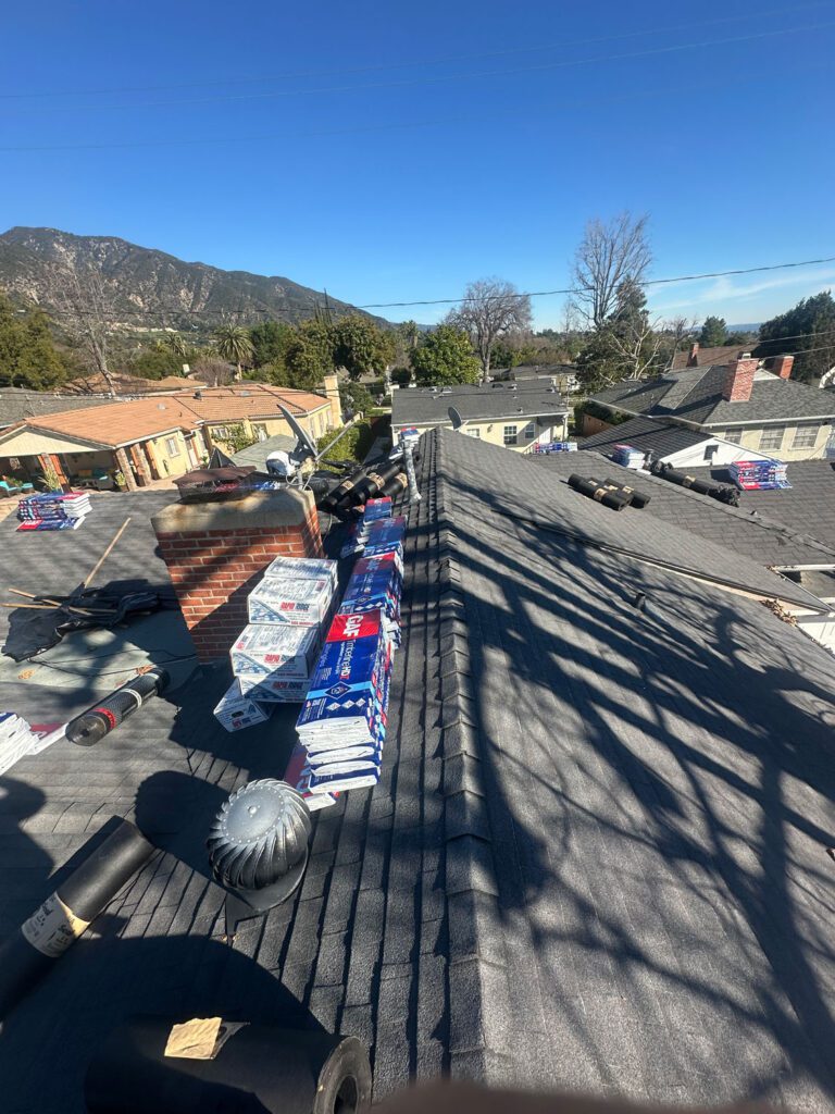 Beginnings of a residential roof install with the roofing materials shown.