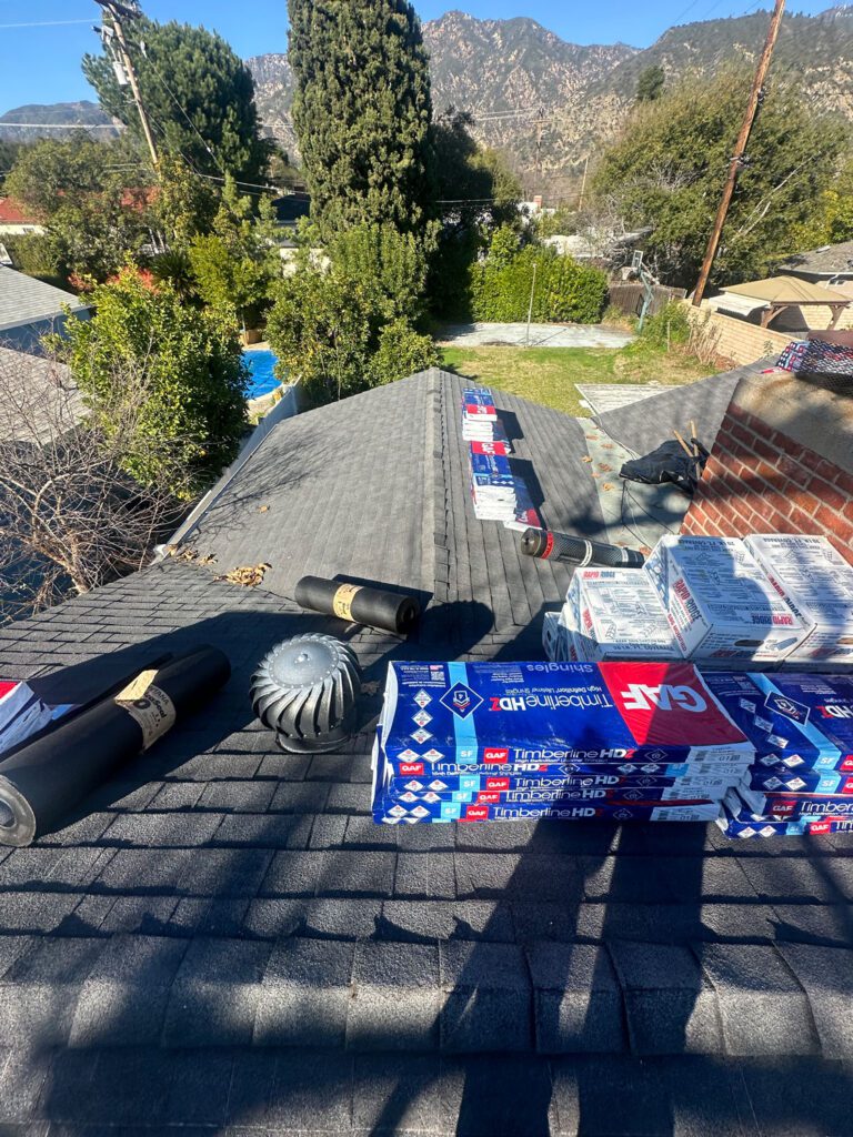 Beginnings of a residential roof install with the roofing materials shown.