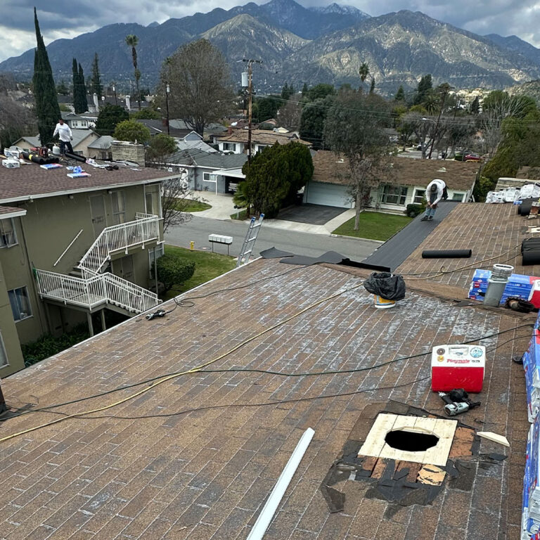 Roofing materials on a roof, getting ready for installation.