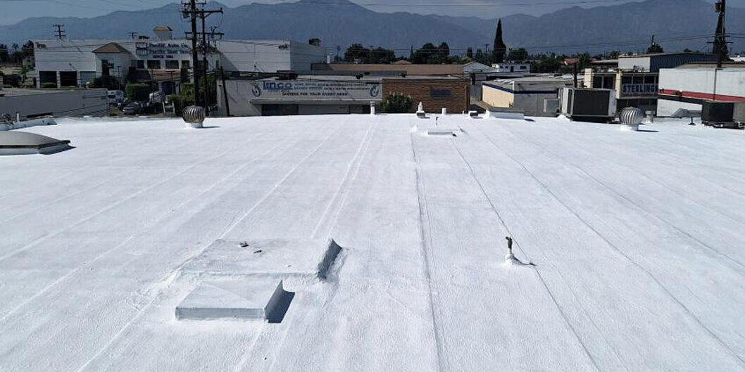 White-Coat-Roof-1500-edited Finished roof with white coating.