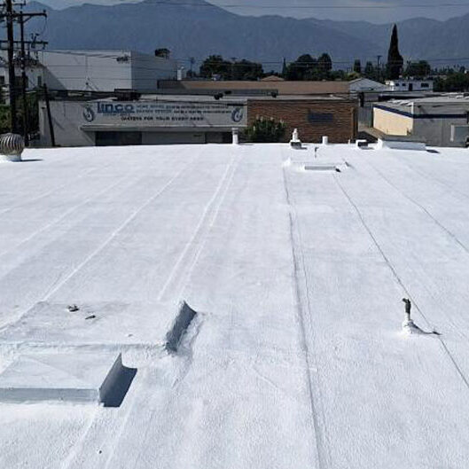 White-Coat-Roof-1500-edited Finished roof with white coating.