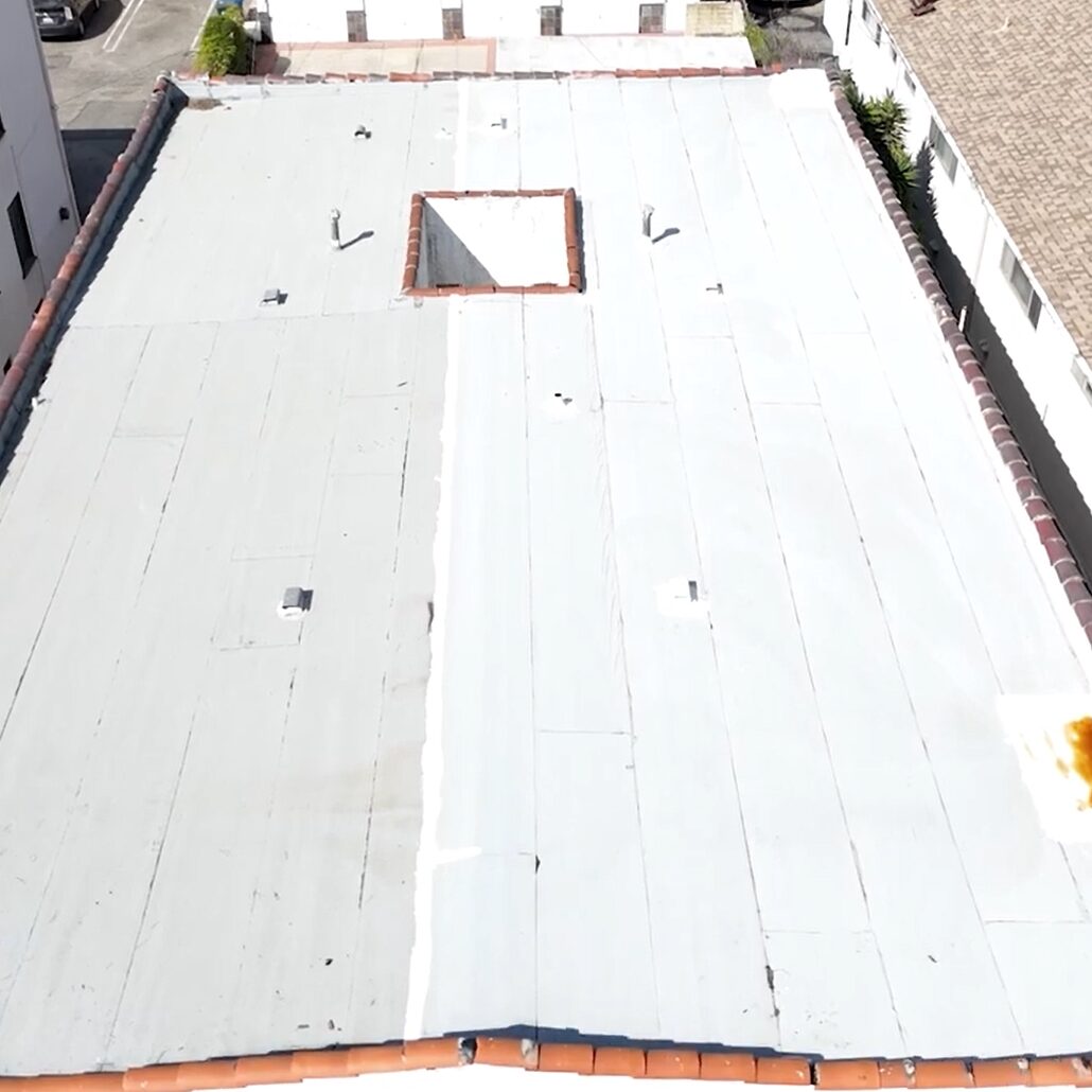 Torch roof service being done by Garvey Roofing Inc.