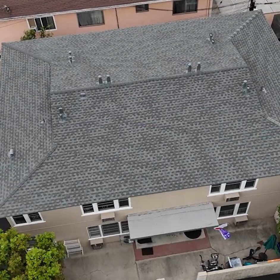 Shingle roof being installed on a residential house.