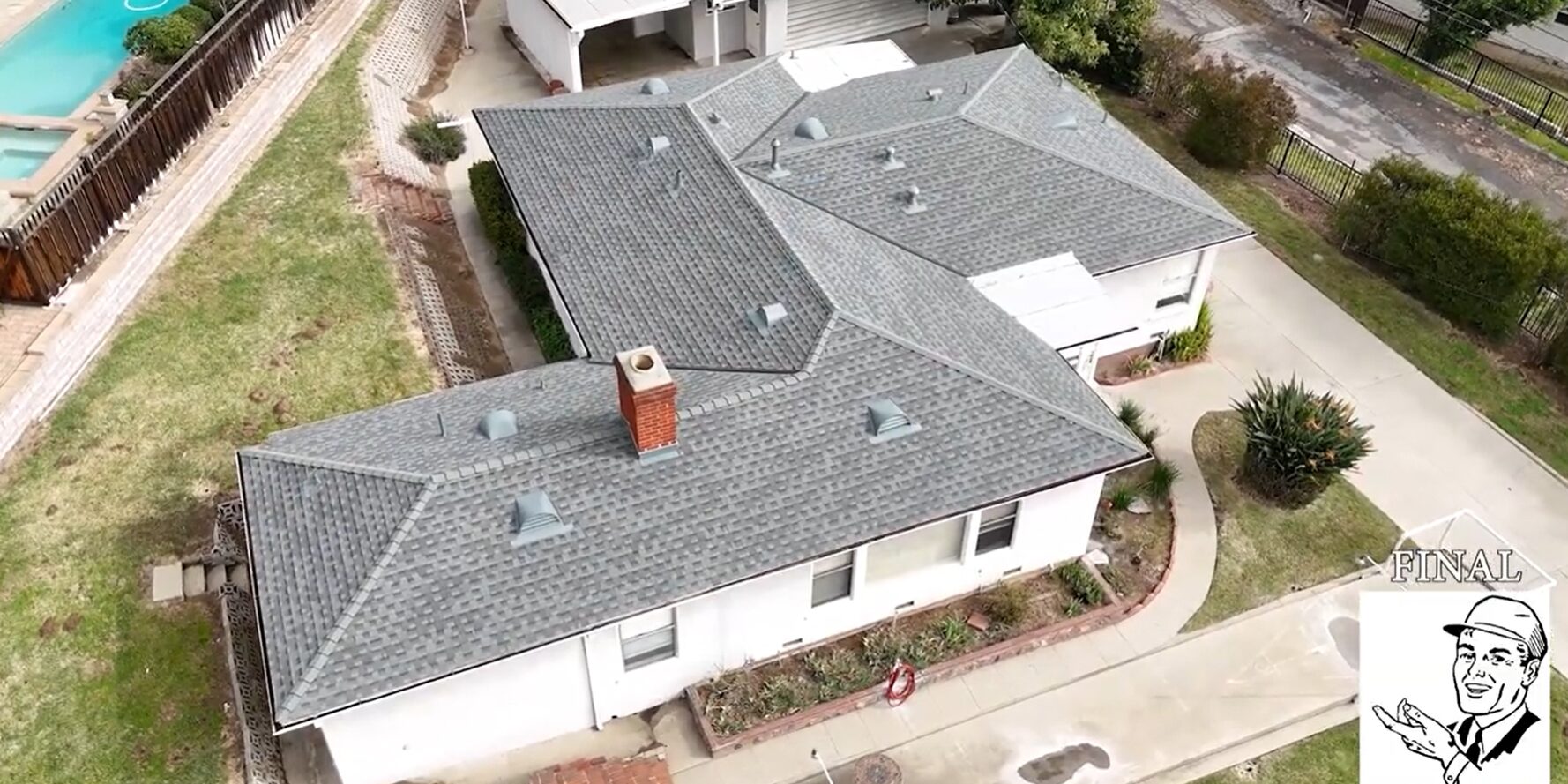 Shingle roof being installed on a residential house by Garvey Roofing Inc.