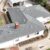 Shingle roof being installed on a residential house by Garvey Roofing Inc.