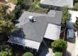 Shingle roof being installed on a residential house.