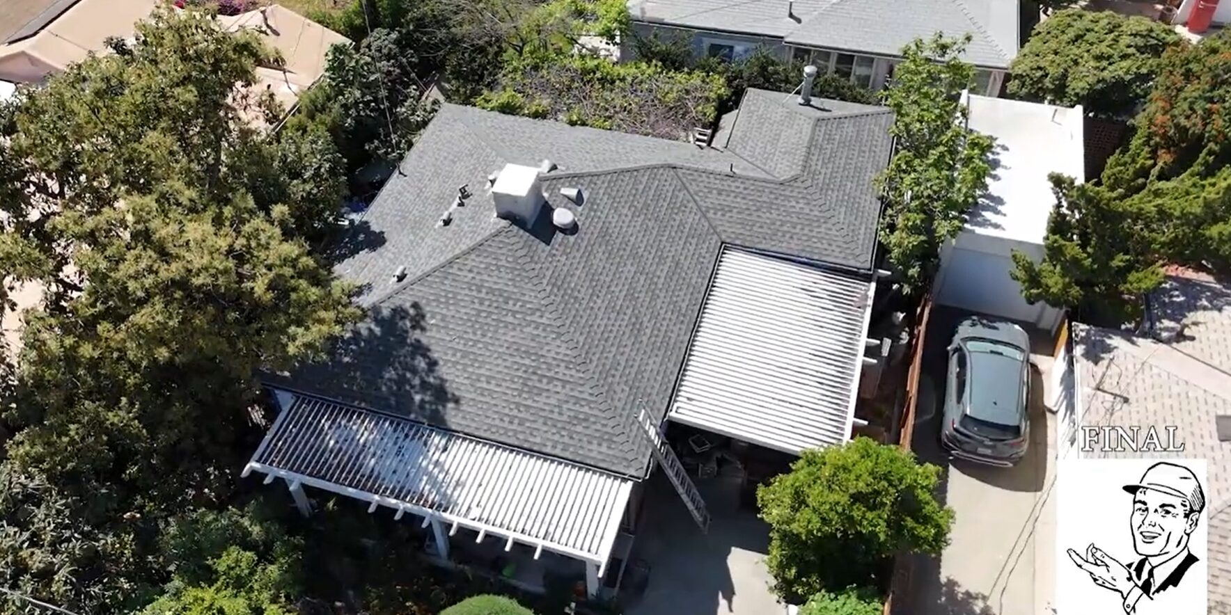 Shingle roof being installed on a residential house.