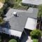 Shingle roof being installed on a residential house.