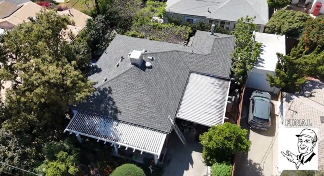 Shingle roof being installed on a residential house.