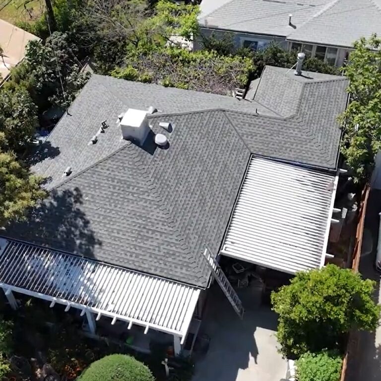 Shingle roof being installed on a residential house.