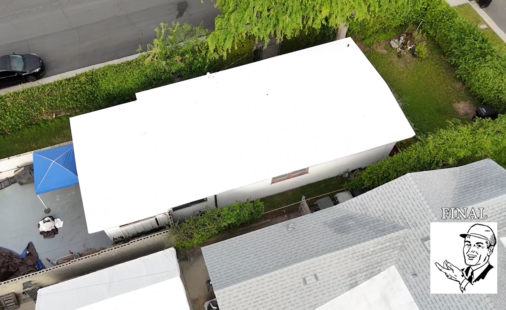 Torch coating being added to a roof.